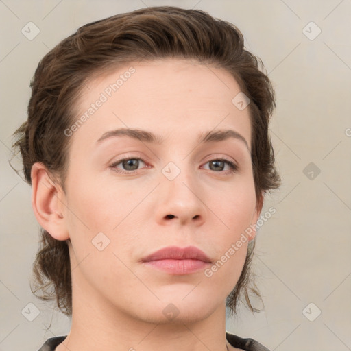 Neutral white young-adult female with medium  brown hair and grey eyes