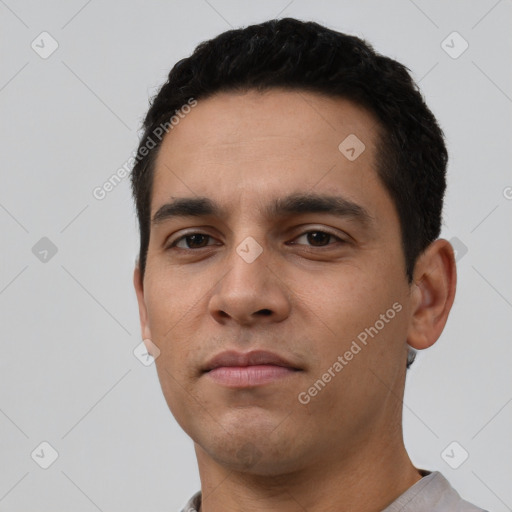 Neutral latino young-adult male with short  black hair and brown eyes