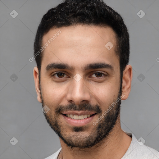 Joyful white young-adult male with short  black hair and brown eyes