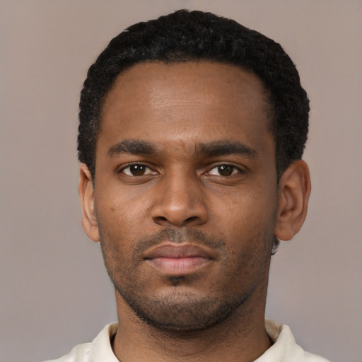 Neutral black young-adult male with short  black hair and brown eyes