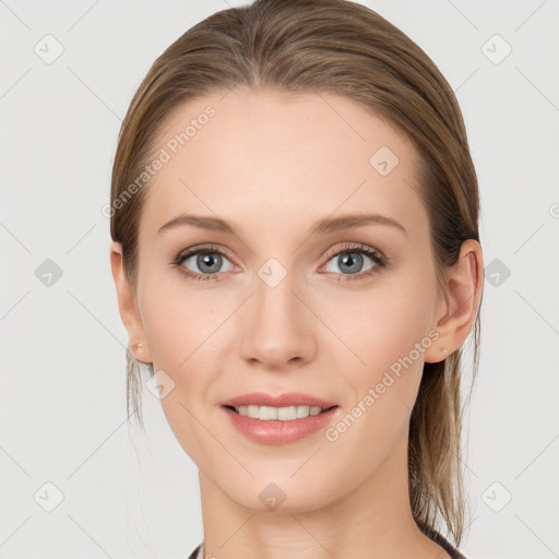 Joyful white young-adult female with medium  brown hair and blue eyes