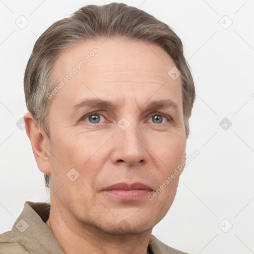 Neutral white adult male with short  brown hair and grey eyes