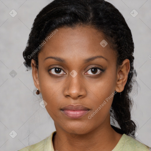 Neutral black young-adult female with medium  black hair and brown eyes