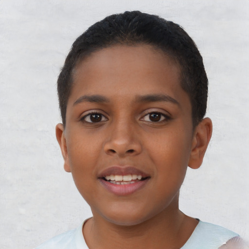 Joyful latino child female with short  brown hair and brown eyes