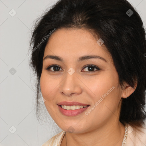 Joyful latino young-adult female with medium  brown hair and brown eyes