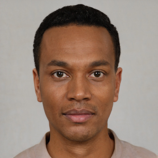 Neutral black young-adult male with short  black hair and brown eyes