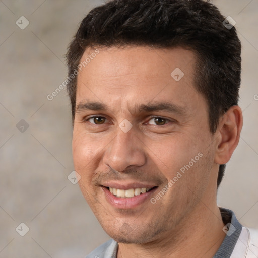 Joyful white adult male with short  brown hair and brown eyes