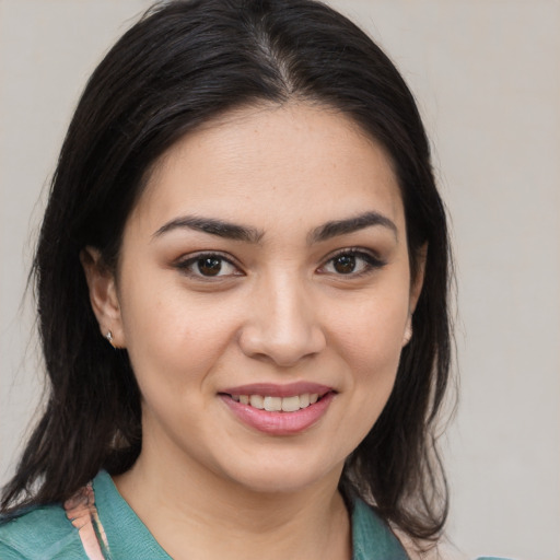 Joyful asian young-adult female with medium  brown hair and brown eyes