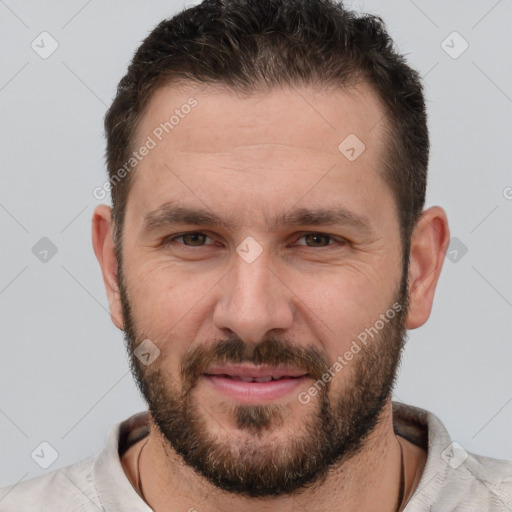 Joyful white adult male with short  brown hair and brown eyes