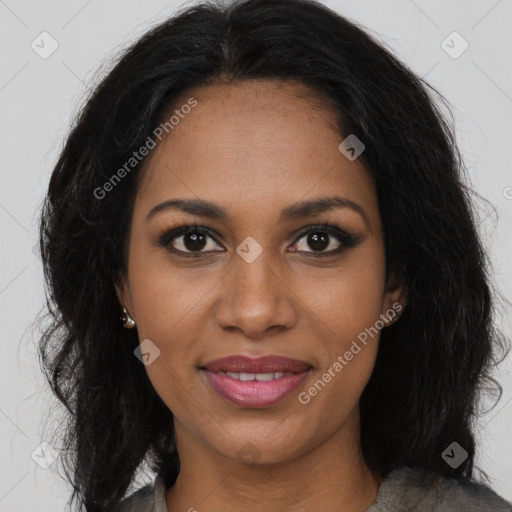 Joyful black young-adult female with long  brown hair and brown eyes