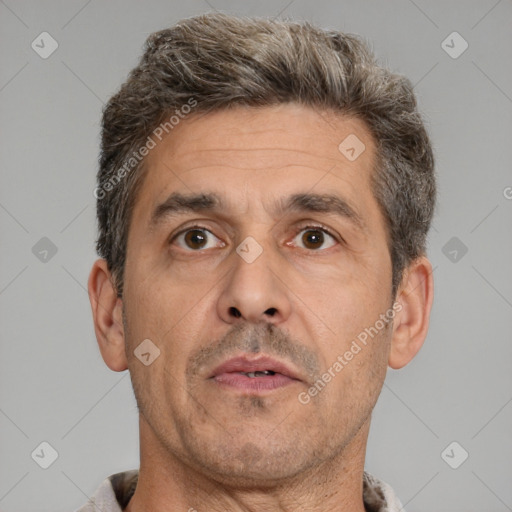 Neutral white adult male with short  brown hair and brown eyes