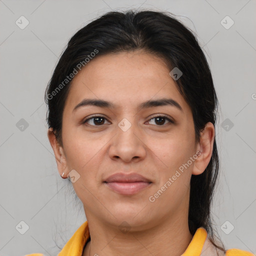 Joyful latino young-adult female with medium  brown hair and brown eyes