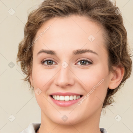 Joyful white young-adult female with medium  brown hair and green eyes