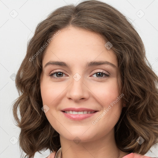 Joyful white young-adult female with long  brown hair and green eyes