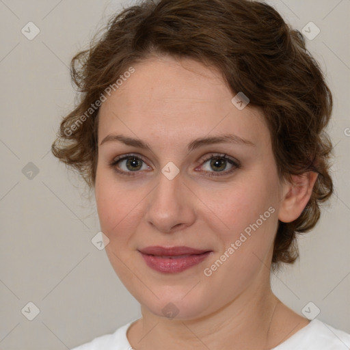 Joyful white young-adult female with medium  brown hair and green eyes