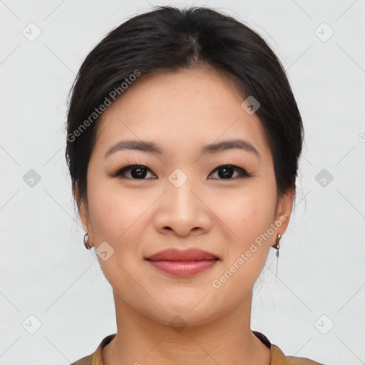 Joyful asian young-adult female with short  brown hair and brown eyes