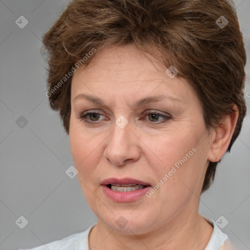 Joyful white adult female with short  brown hair and brown eyes