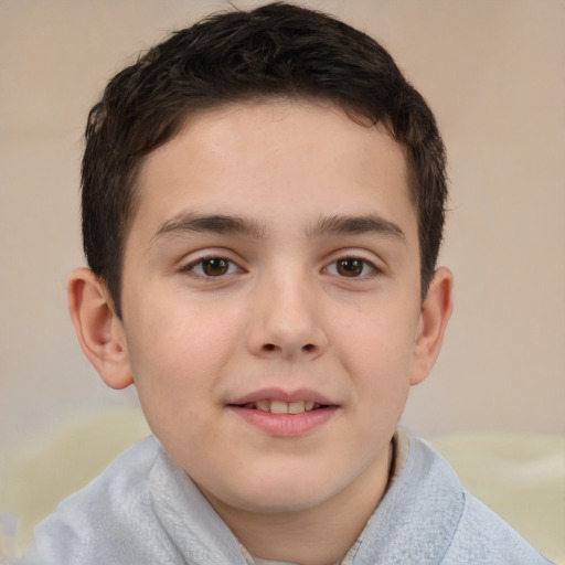 Joyful white child male with short  brown hair and brown eyes