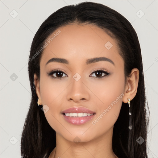 Joyful latino young-adult female with long  black hair and brown eyes