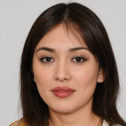Neutral white young-adult female with long  brown hair and brown eyes