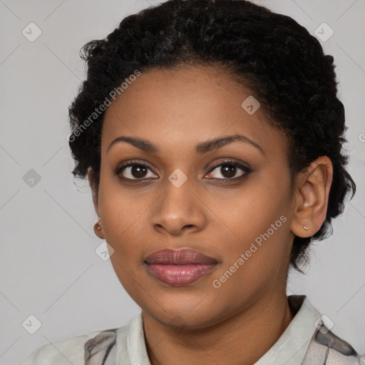 Joyful black young-adult female with medium  black hair and brown eyes