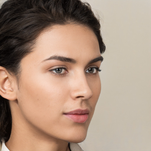 Neutral white young-adult female with medium  brown hair and brown eyes