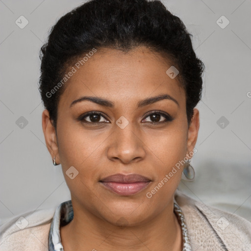 Joyful black young-adult female with short  brown hair and brown eyes