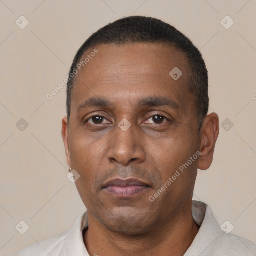 Neutral black adult male with short  black hair and brown eyes