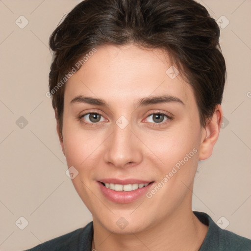 Joyful white young-adult female with short  brown hair and brown eyes