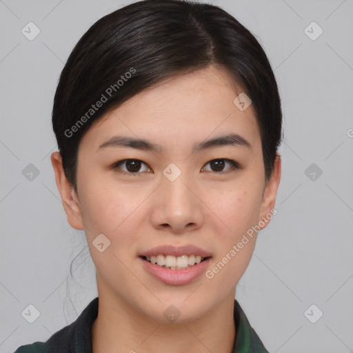 Joyful asian young-adult female with short  brown hair and brown eyes