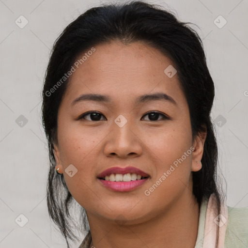 Joyful latino young-adult female with medium  brown hair and brown eyes