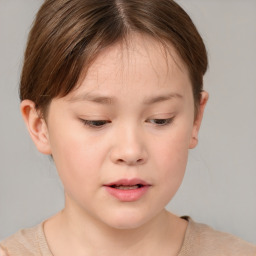 Joyful white child female with short  brown hair and brown eyes