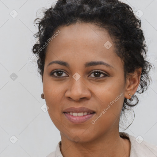 Joyful latino young-adult female with short  black hair and brown eyes