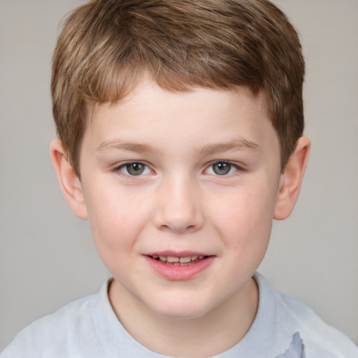 Joyful white child male with short  brown hair and brown eyes