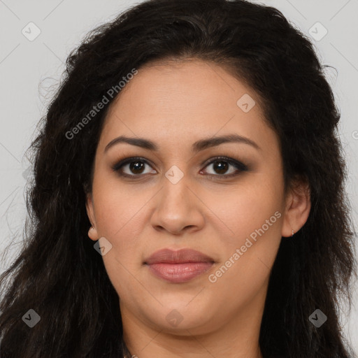 Joyful latino young-adult female with long  brown hair and brown eyes