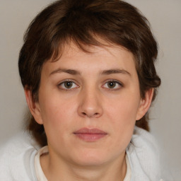 Neutral white young-adult female with medium  brown hair and brown eyes