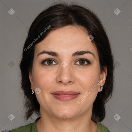 Joyful white adult female with medium  brown hair and brown eyes