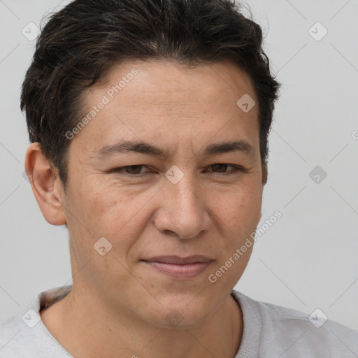 Joyful white adult male with short  brown hair and brown eyes