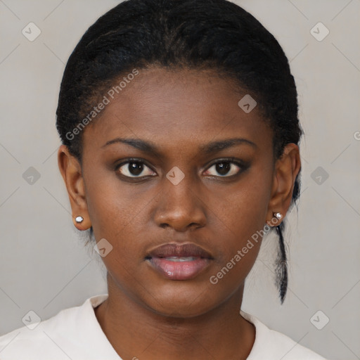 Neutral black young-adult female with short  brown hair and brown eyes