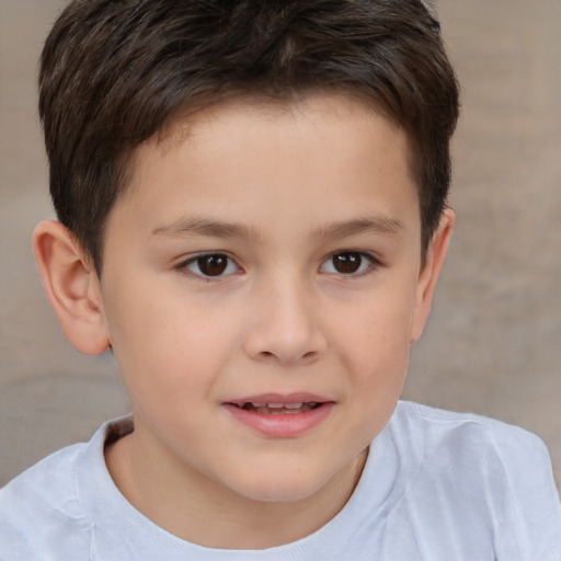 Joyful white child male with short  brown hair and brown eyes