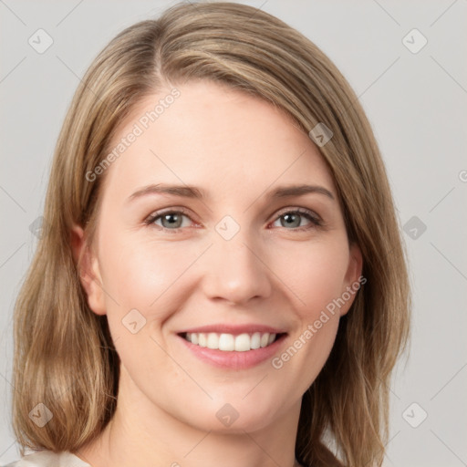 Joyful white young-adult female with medium  brown hair and blue eyes