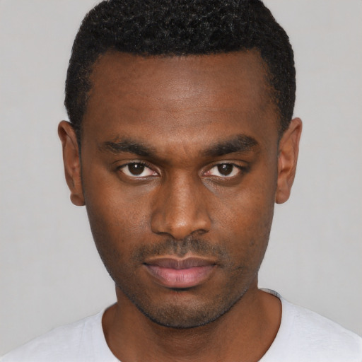 Neutral black young-adult male with short  brown hair and brown eyes