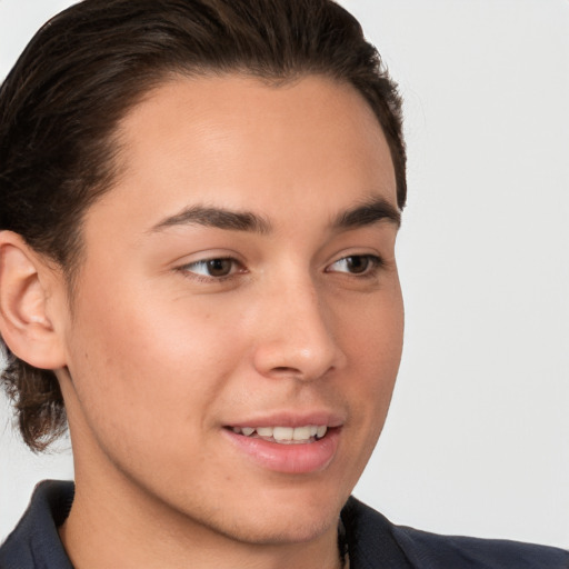 Joyful white young-adult male with medium  brown hair and brown eyes