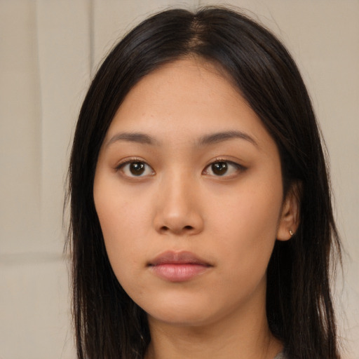 Neutral asian young-adult female with long  brown hair and brown eyes