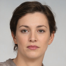 Neutral white young-adult female with short  brown hair and brown eyes