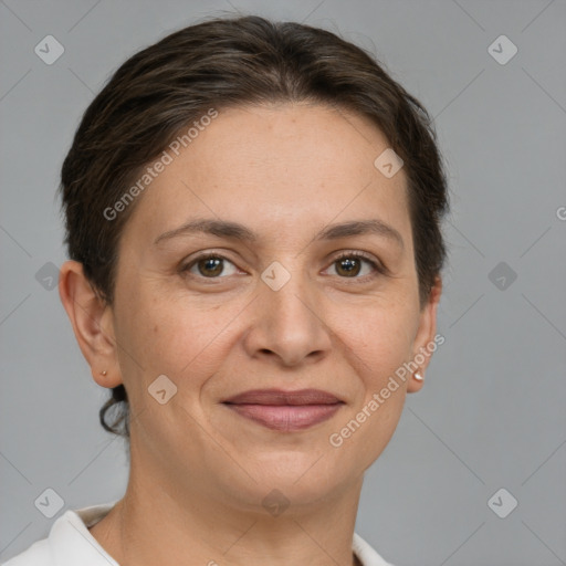 Joyful white adult female with short  brown hair and brown eyes