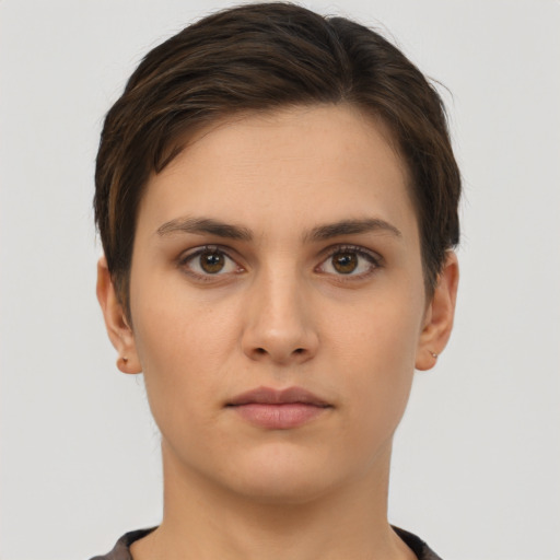 Neutral white young-adult female with short  brown hair and brown eyes