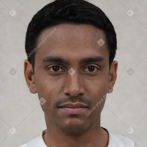 Neutral latino young-adult male with short  black hair and brown eyes