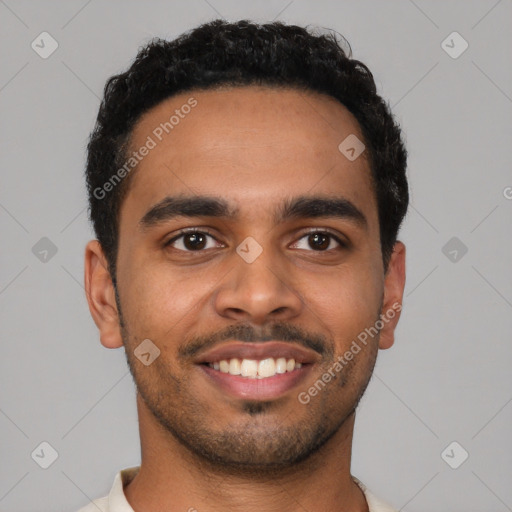 Joyful latino young-adult male with short  black hair and brown eyes