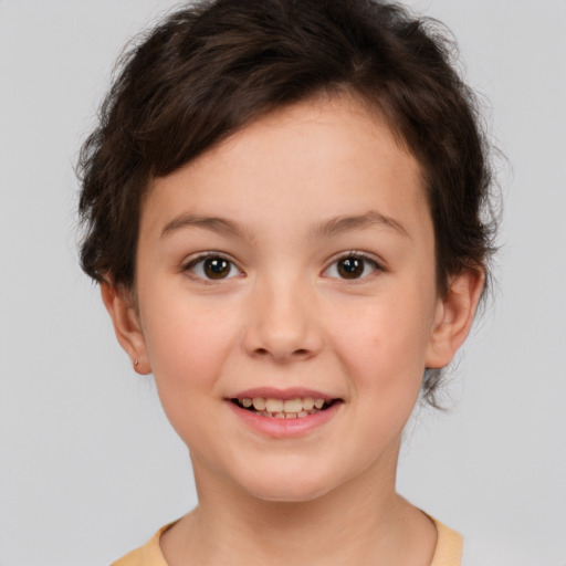 Joyful white child female with short  brown hair and brown eyes